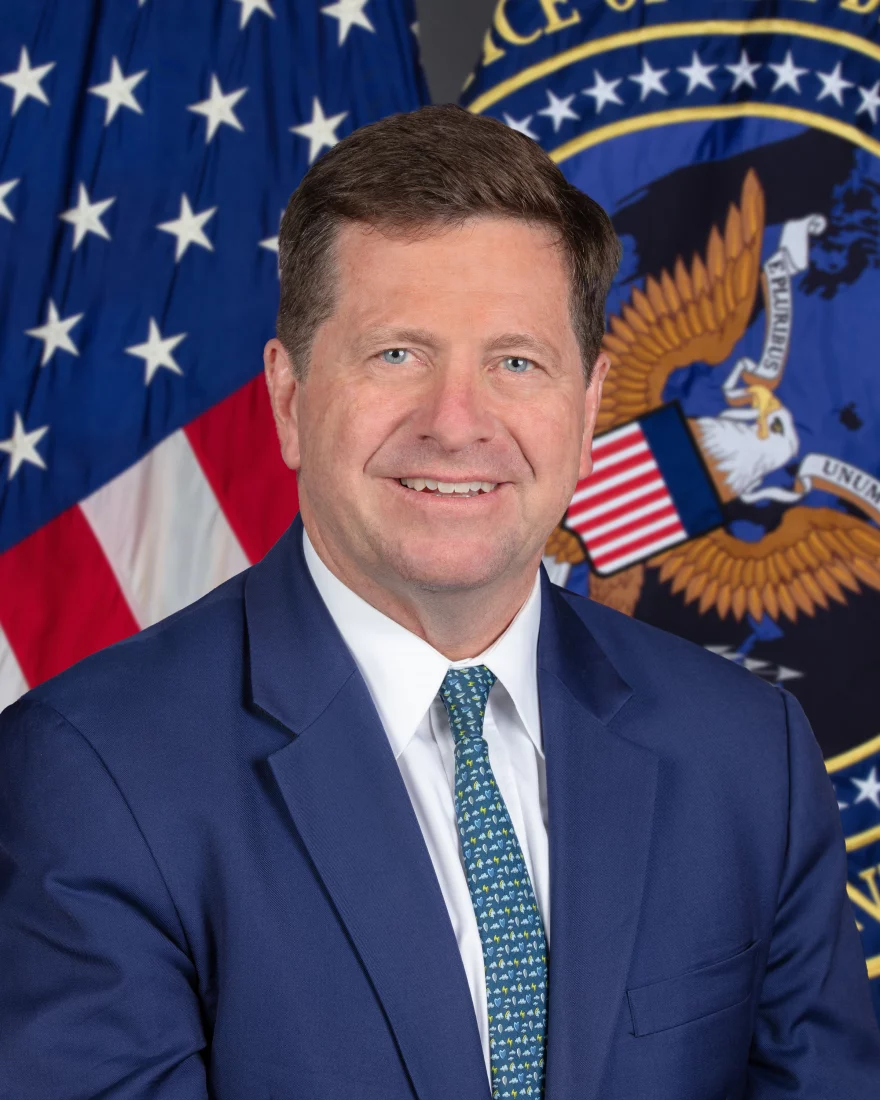 Headshot or formal portrait of Jay Clayton