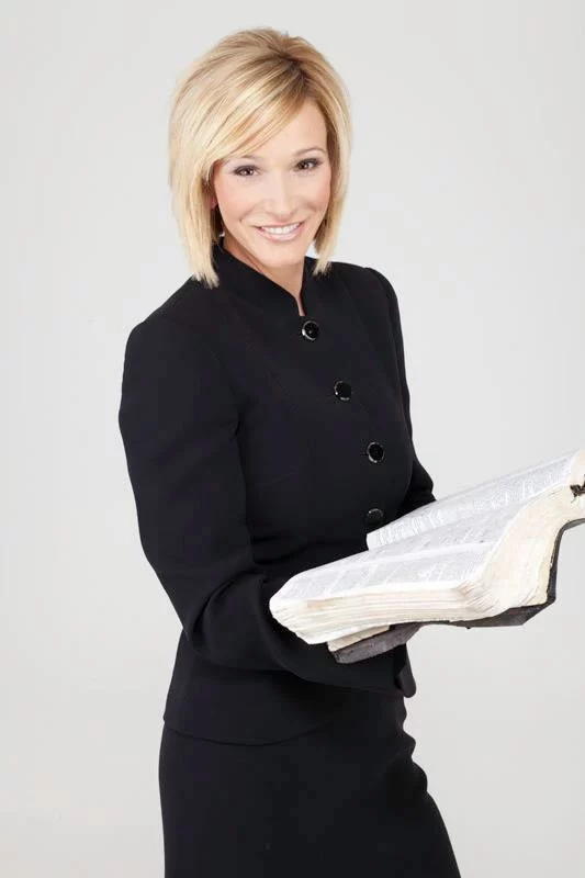 Headshot or formal portrait of Paula White-Cain