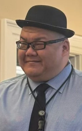 Headshot or formal portrait of Steven Cheung